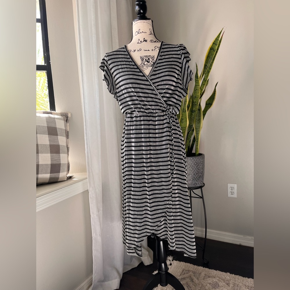 Striped black and white wrap dress size medium. By caution to the wind